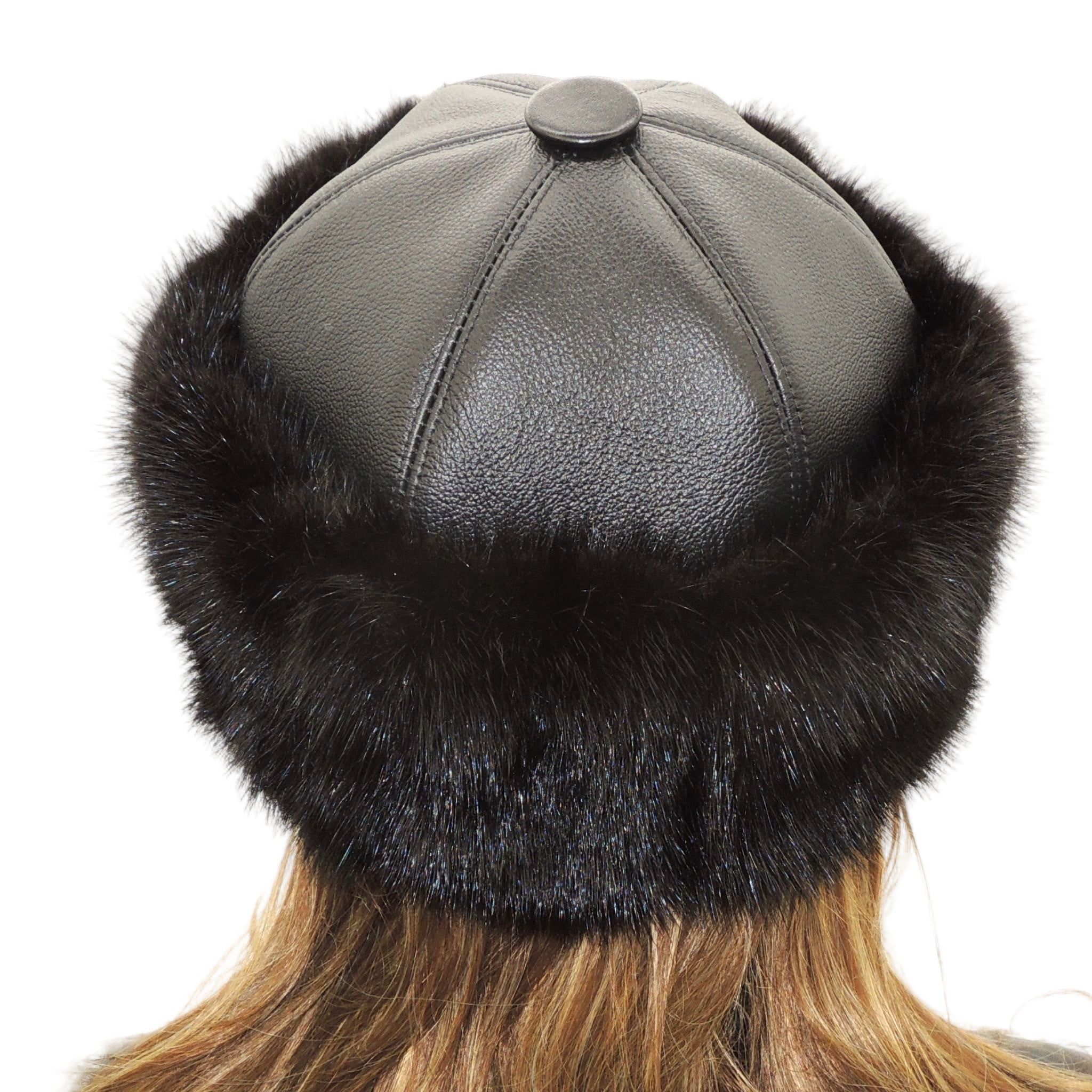Back view of the handmade black leather cloche hat with recycled mink fur brim, designed and made in Quebec.