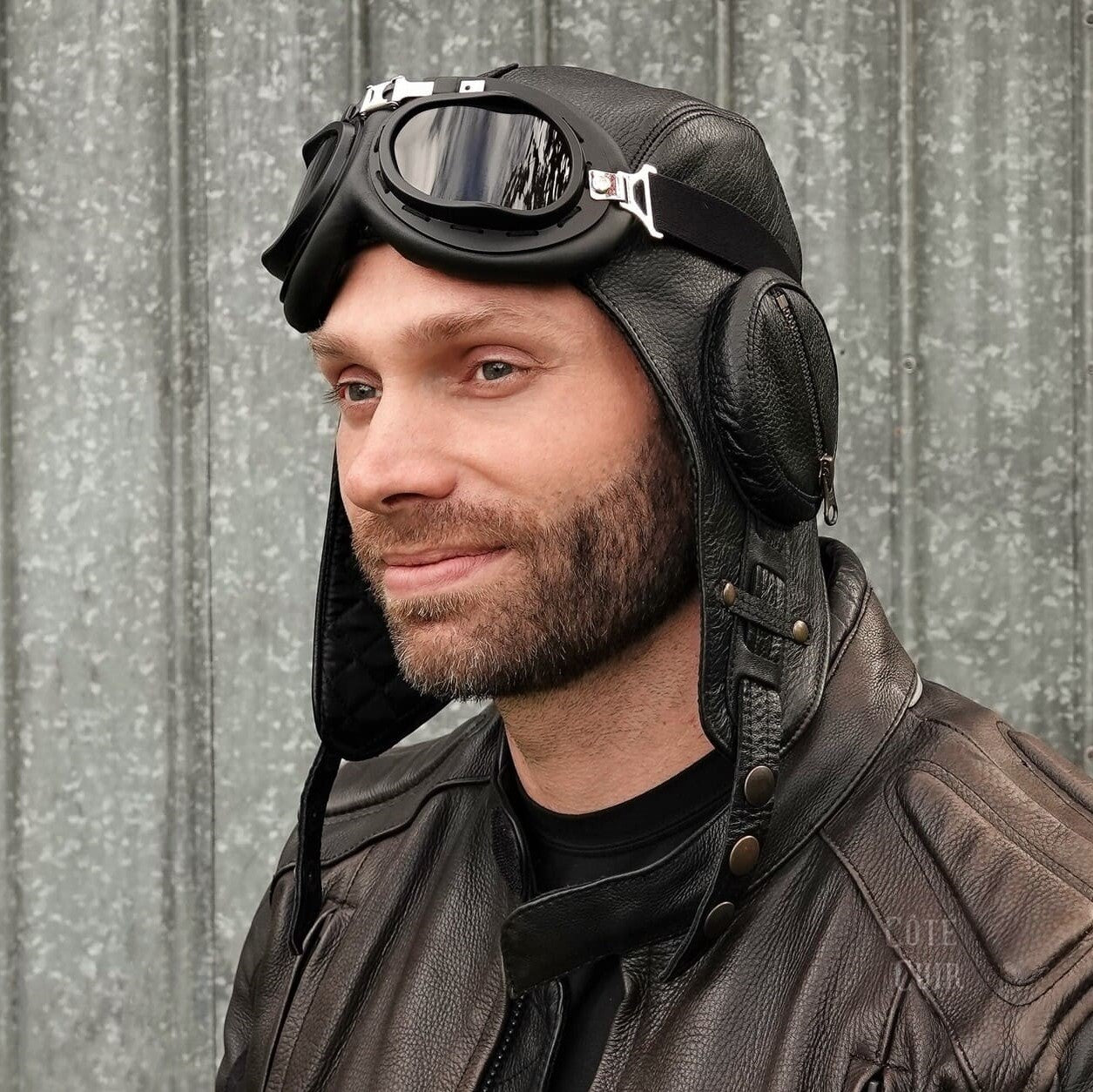 black leather pilot helmet