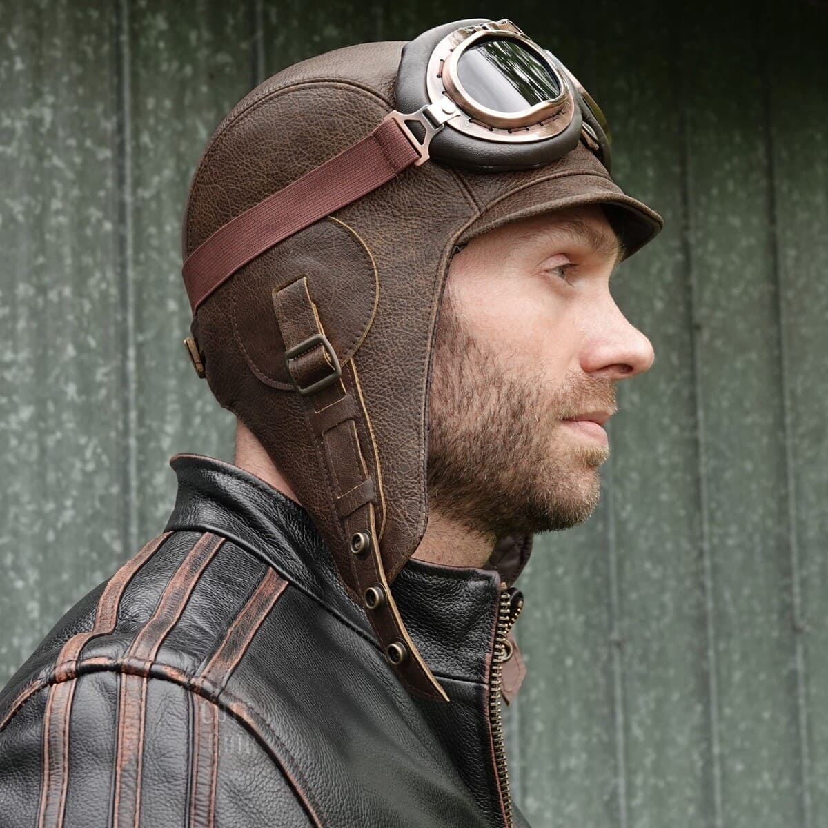 brown aviator cap and goggles