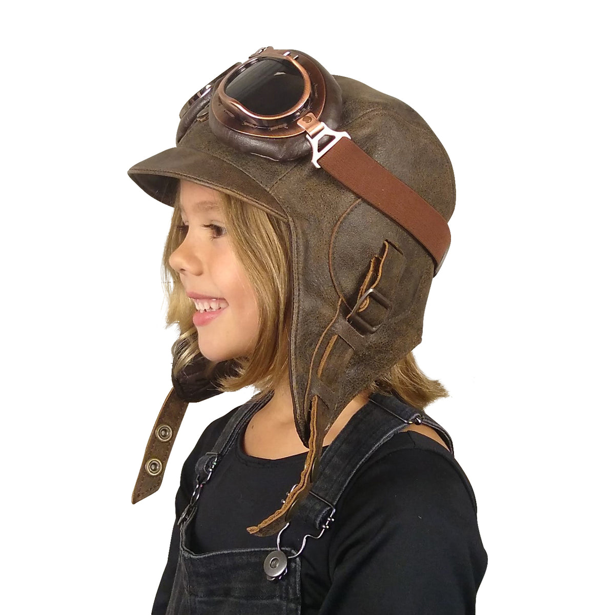 Smiling girl wearing the brown leather Kids Aviator Hat, Simon Model, with goggles