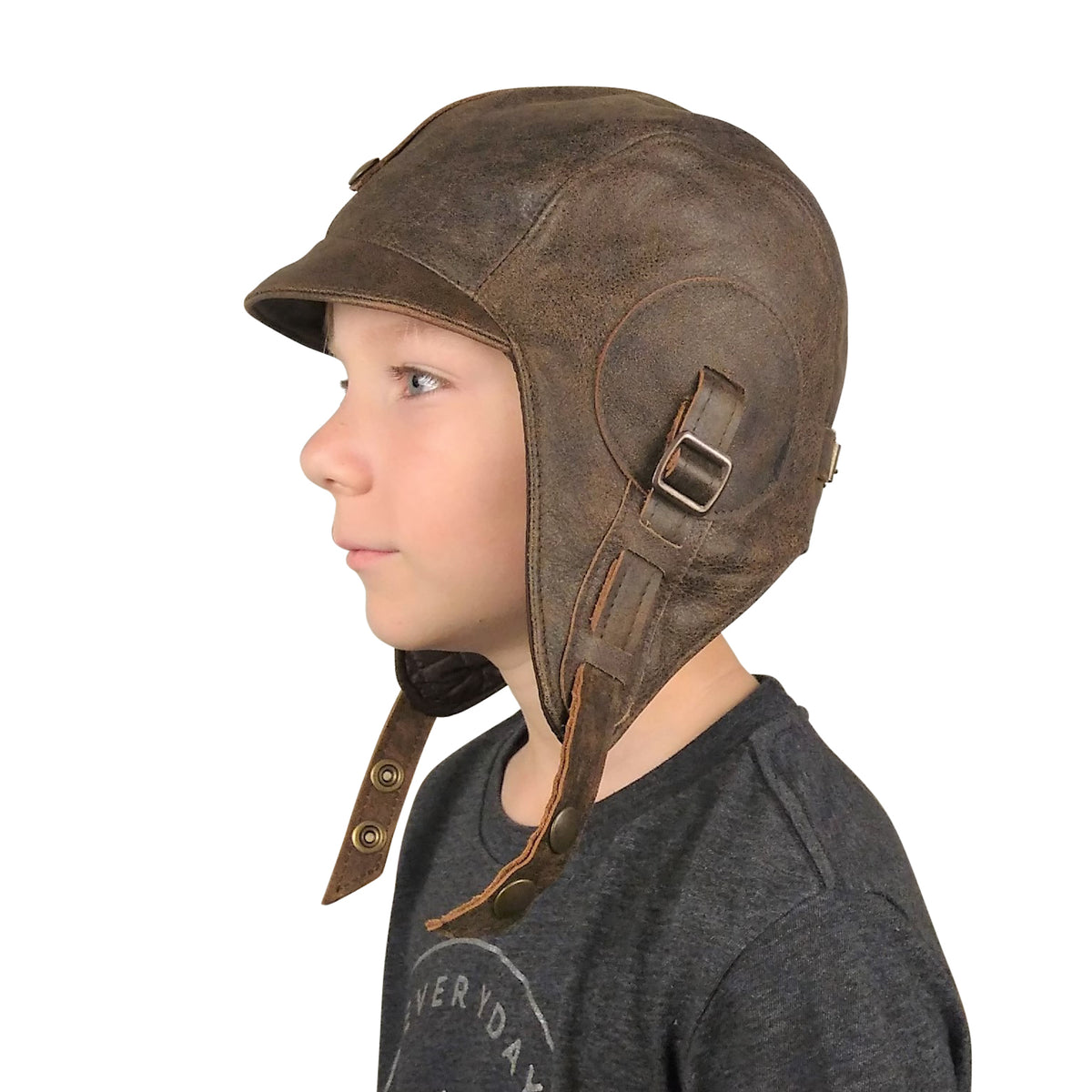 Boy wearing the brown leather Kids Aviator Hat, Simon Model, side view without goggles
