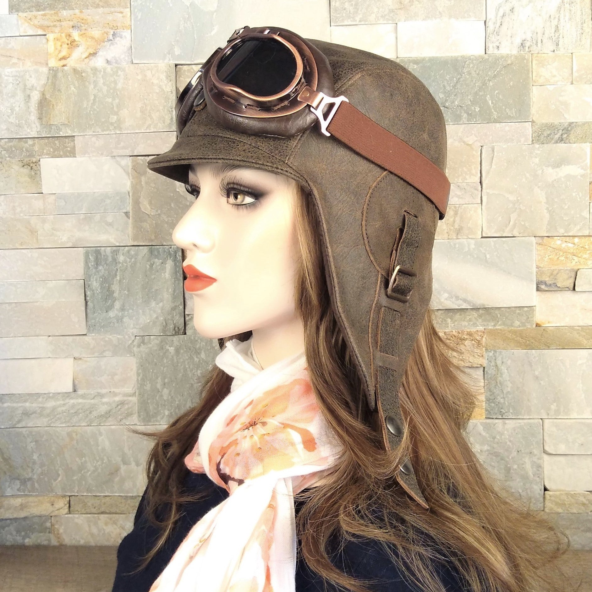 Vintage brown leather aviator hat and goggles