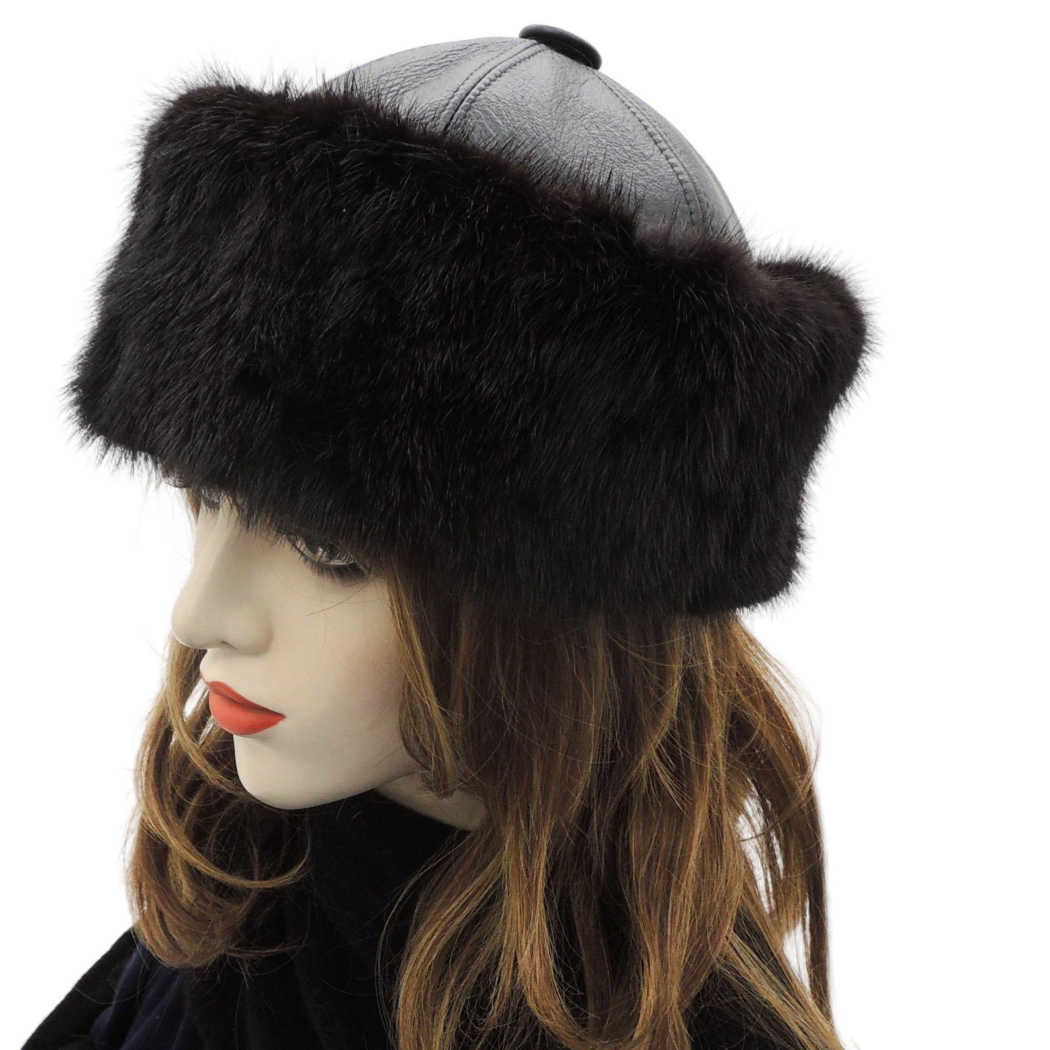 Side view of the black leather and recycled mink cloche hat showing the elegant vintage silhouette and soft fur trim.