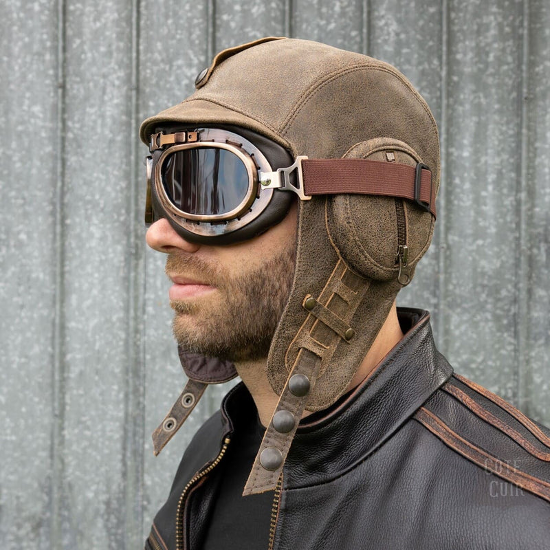 leather aviator cap and goggles
