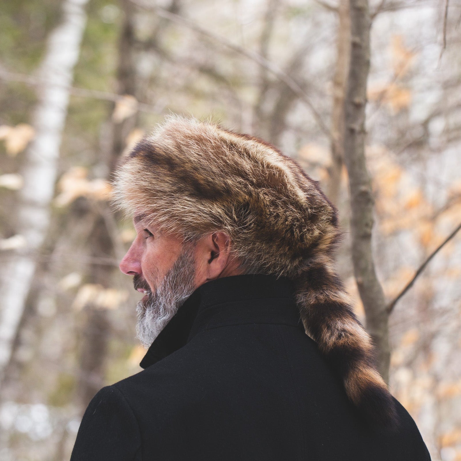 Man with Davy Crockett coonskin hat with real raccoon tail