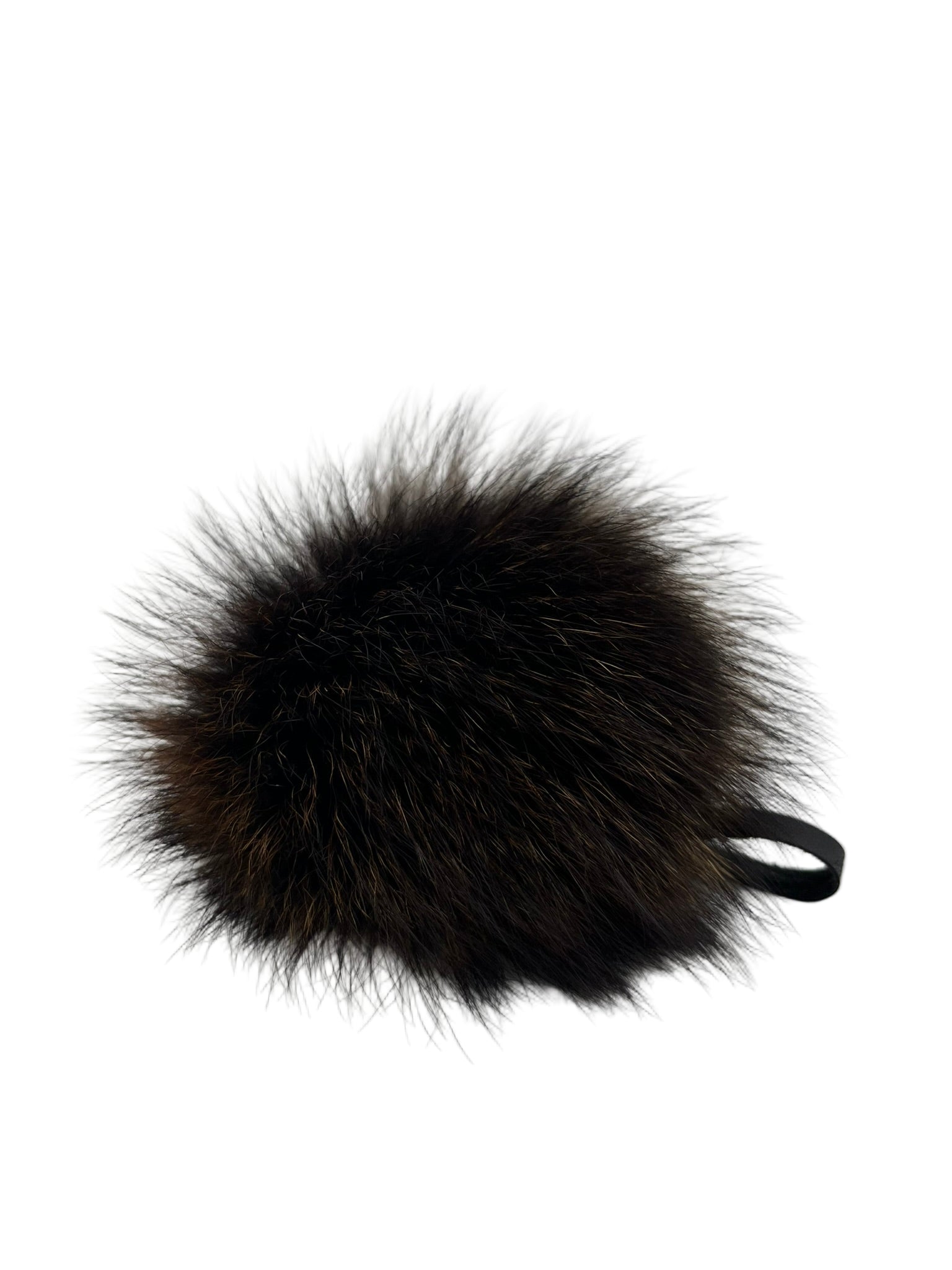 Genuine raccoon fur pom-pom with leather tie strap. Handmade in Quebec. Full, rounded volume for beanies, hoods and bags.