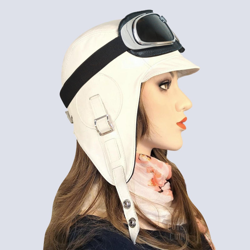 white aviator helmet and goggles