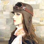 Vintage brown leather aviator hat and goggles