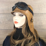 tan leather aviator hat and goggles