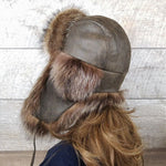 brown leather trapper hat