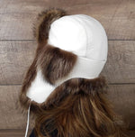 white trapper hat