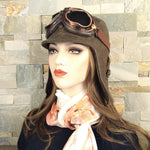 vintage brown aviator hat with goggles